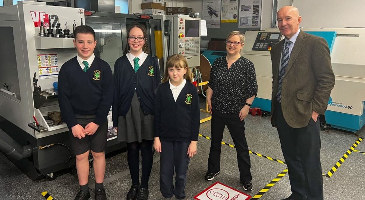 Bangor Central Integrated Primary School Students with Aine McGreeghan SERC Engineering Curriculum Manager, Steve Galvin, Vice Principal of Bangor Central Integrated Primary School.